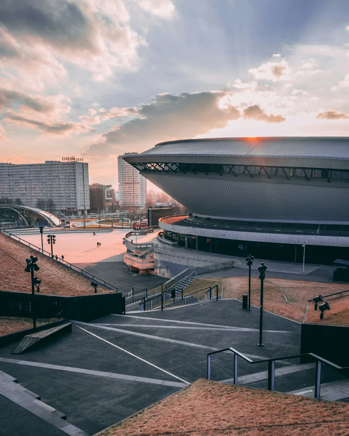 Katowice's Spodek arena and the steps around it at sunset