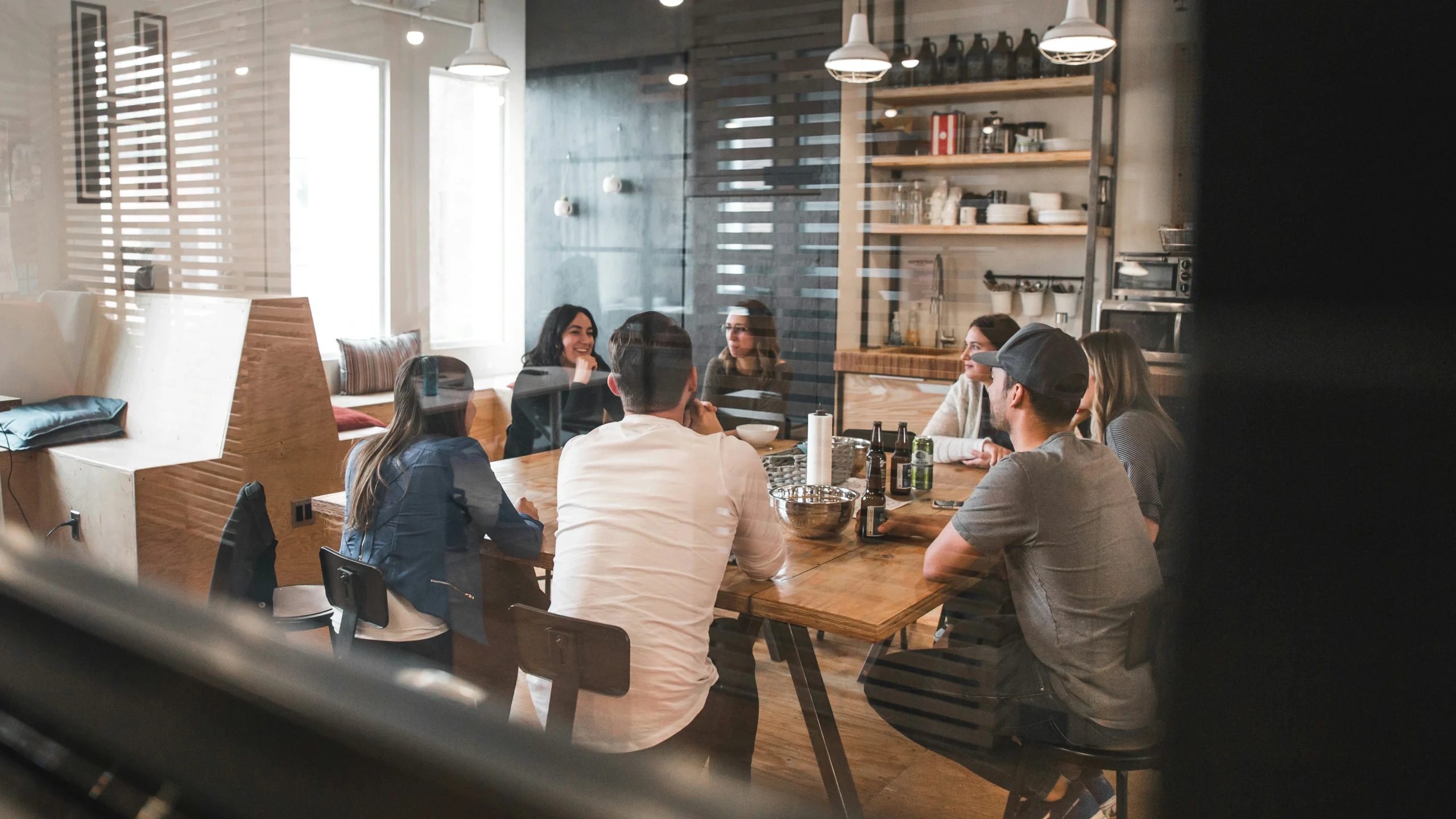 A VeritaHR consultant meeting a client team